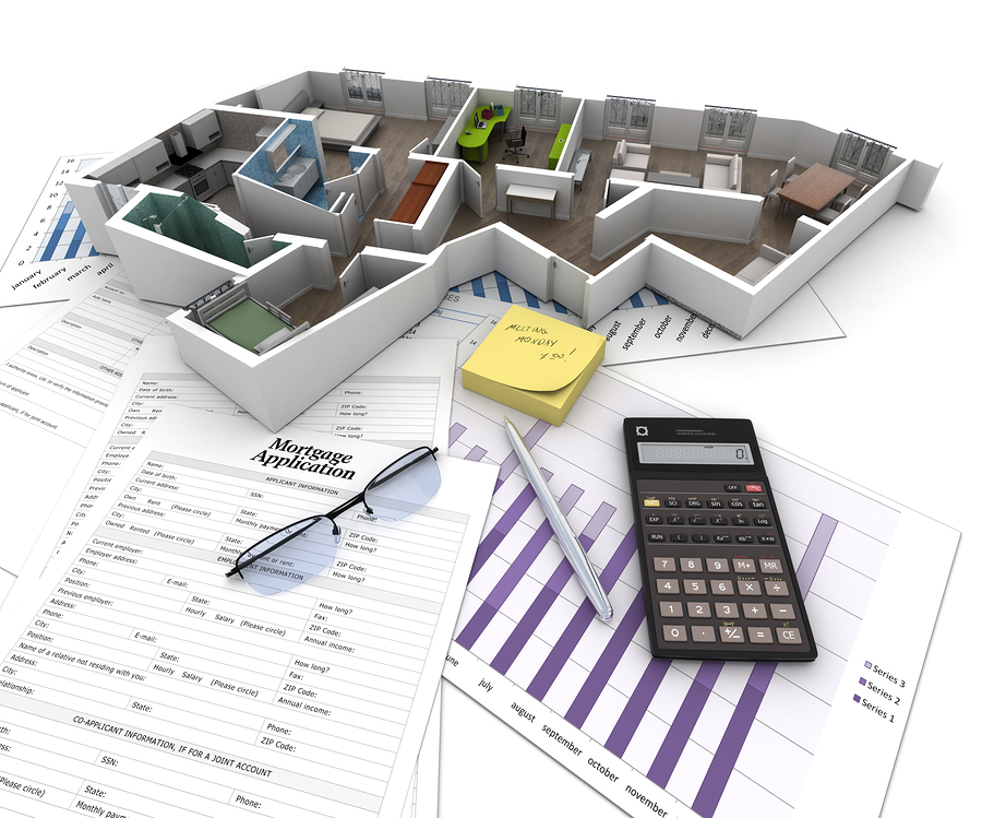 Cross section of an apartment on top of a table with mortgage ap