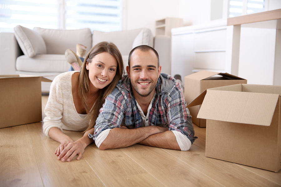 Young adults moving in new home